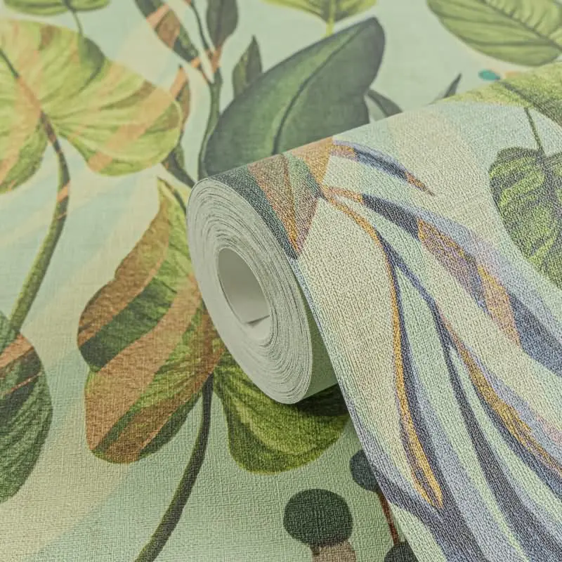 Tropische Tapete mit großflächigem Blattmotiv in Grüntönen auf mintgrünem Grund livingwalls (KG-175226)