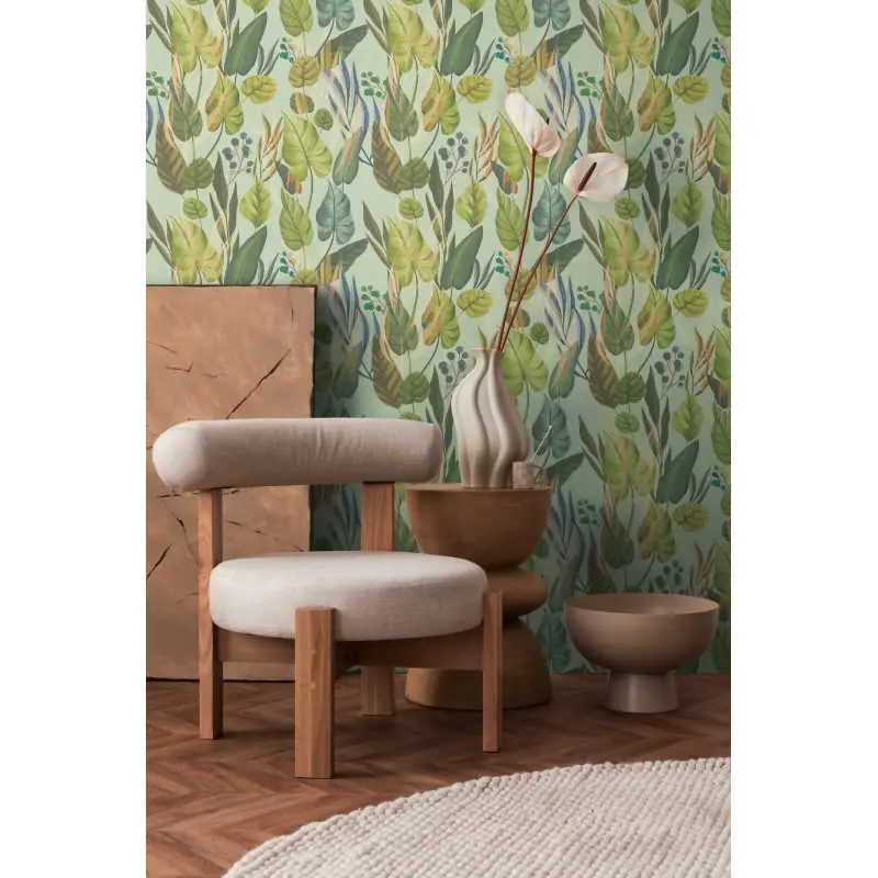 Tropische Tapete mit großflächigem Blattmotiv in Grüntönen auf mintgrünem Grund livingwalls (KG-175226)
